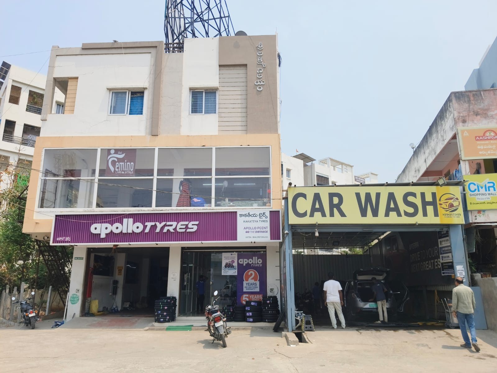Kakatiya Tyres Apollo showroom and car wash exterior in Hanamkonda
